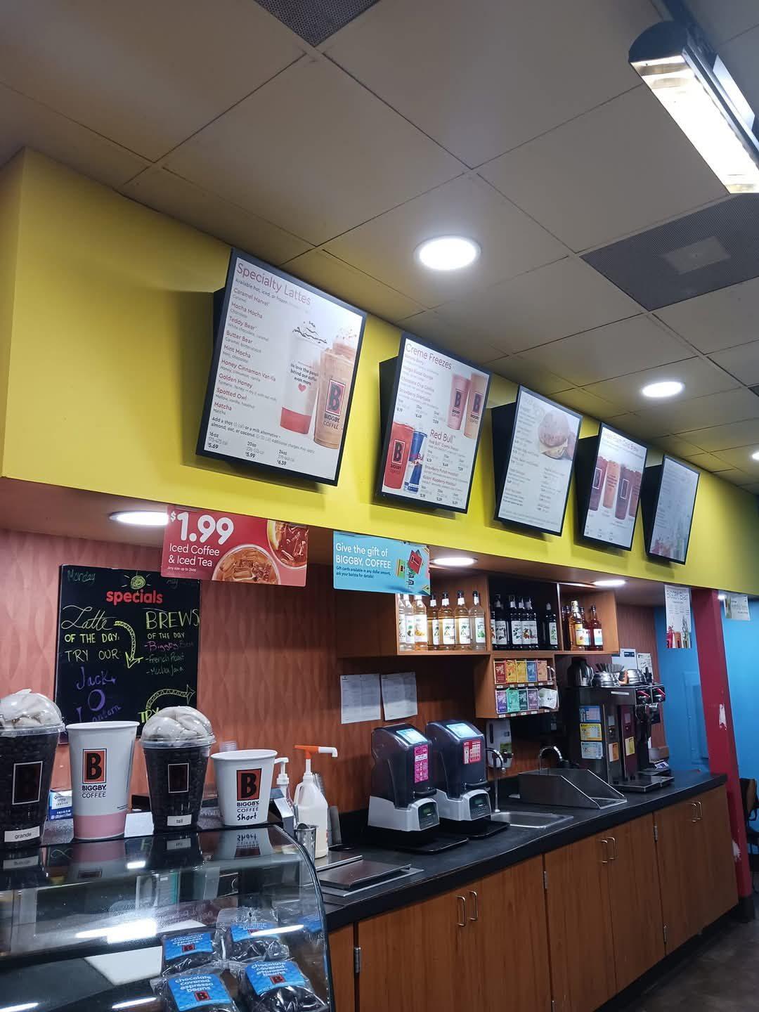 Café service counter with a replaced suspended ceiling above it
